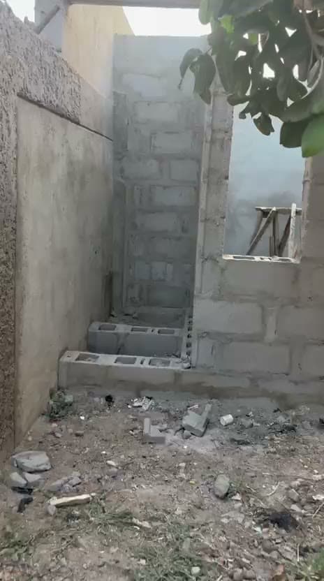 New block walls being built in the compound