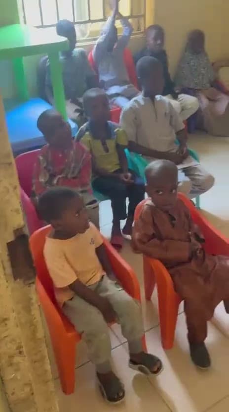 Children listening during a lesson at a school restored by the foundation